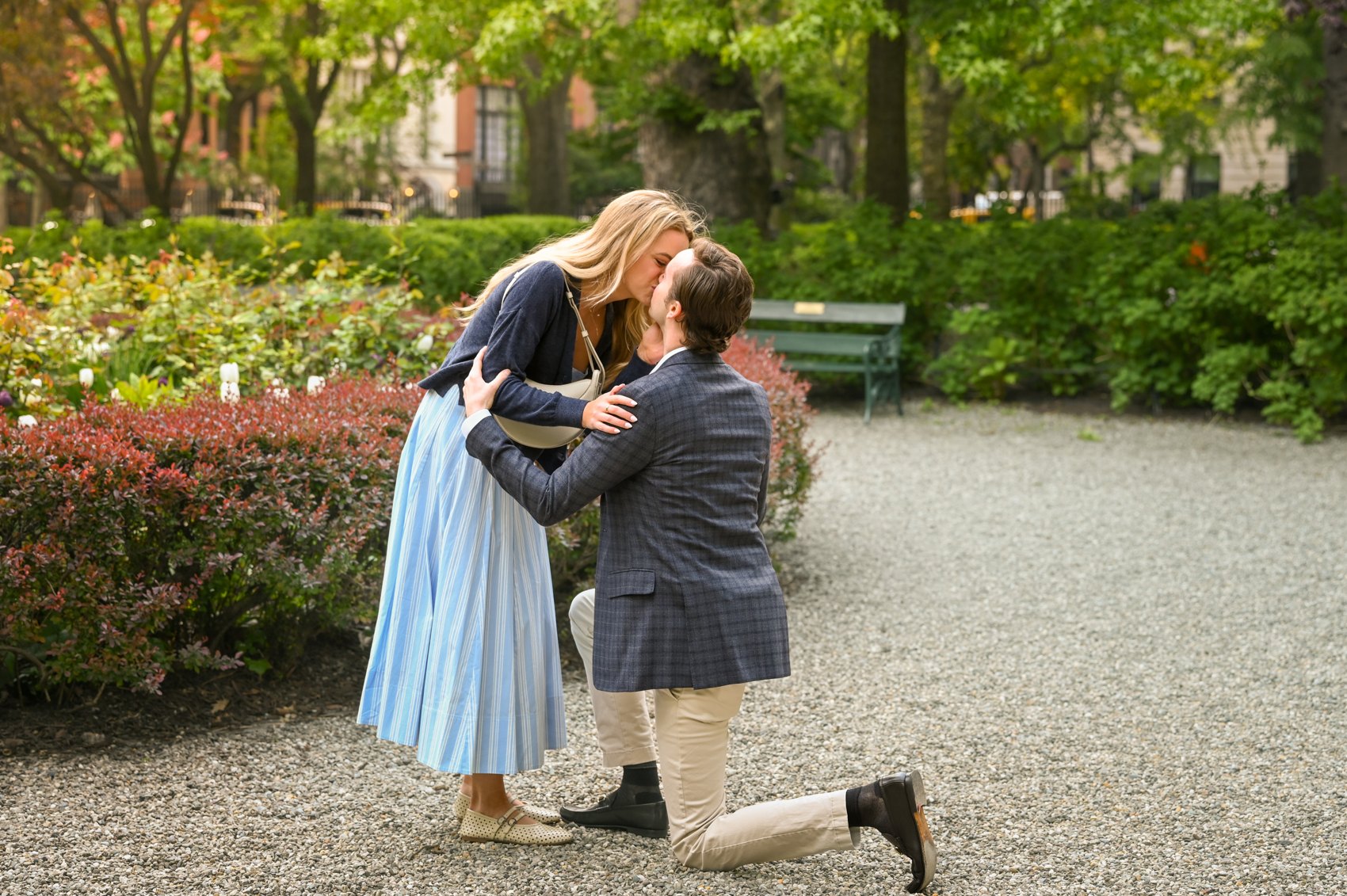 Kaitlin and Nick kissing right after the proposal, Nick still kneeling